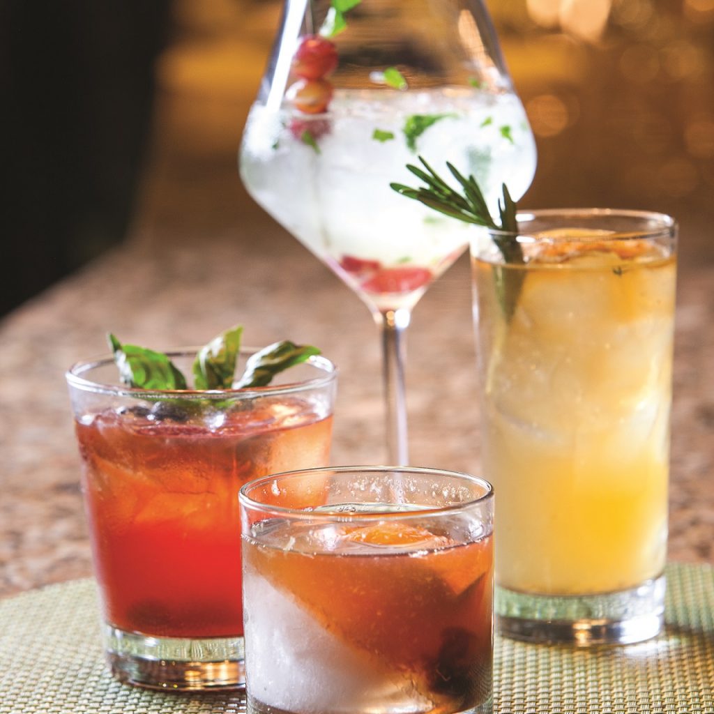 cocktails with herb garnishes
